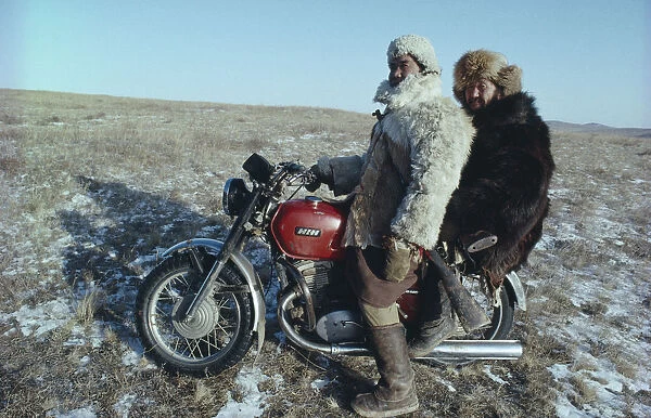 20055138. MONGOLIA Transport Mongol Ton up men on motorbike dressed in fur clothes