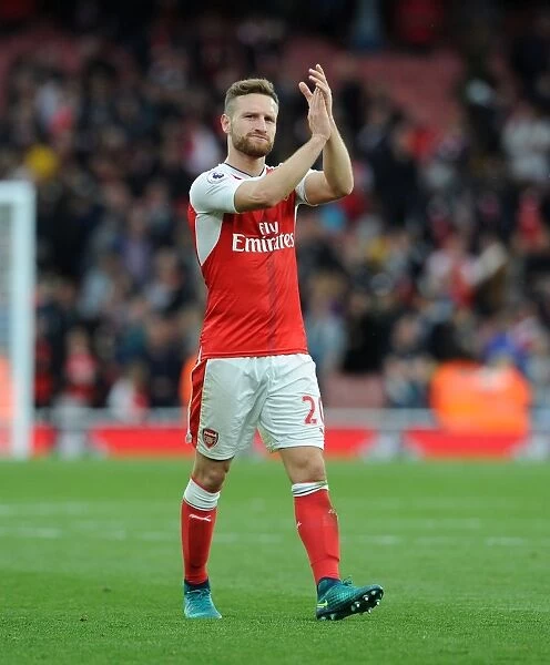 Arsenal's Mustafi Celebrates with Fans: Arsenal's Victory over Swansea City (2016-17)