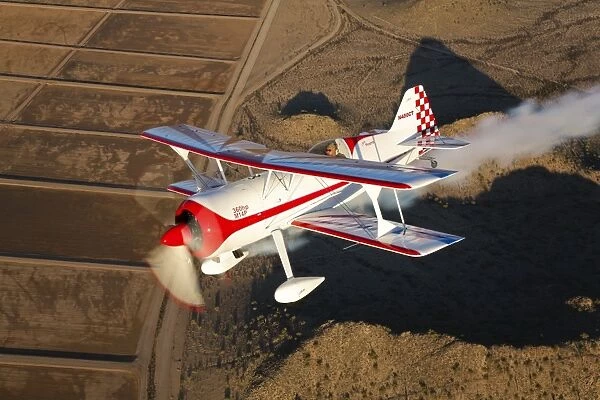 A Pitts Model 12 aircraft in flight