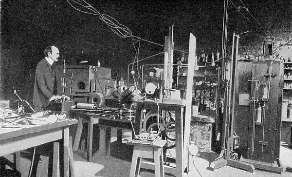 JJ Thomson, British physicist, at work in the Cavendish Laboratory, Cambridge