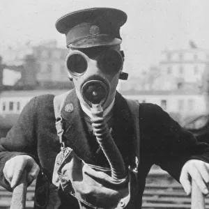 GWR station staff member in a gas mask, c. 1939