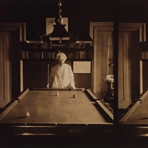 Samuel Clemens, half-length portrait, standing at end of poo