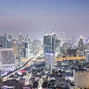 City skyline looking along the BTS Skytrain, Sukhumvit Road and Phloen Chit, with
