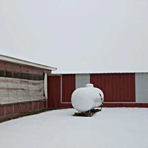 A propane tank stands outside a hog building at Duncan Farms in Polo