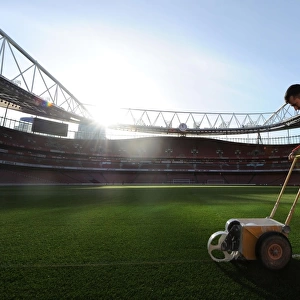 Arsenal's Groundsman Prepares the Pitch for Arsenal v West Bromwich Albion (2016-17)