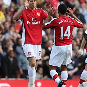 Nicklas Bendtner celebrates scoring the 6th Arsenal