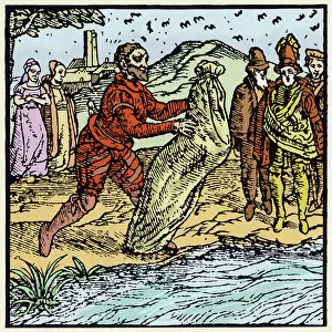 Witchcraft: an assumed witch is subjected to water test. Engraving of the 16th century