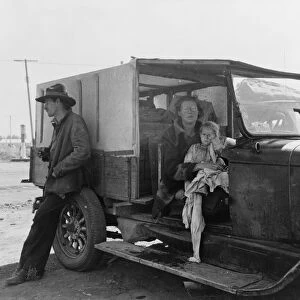 Family, one month from South Dakota, now on the road... Tulelake, Siskiyou County, California, 1939 Creator: Dorothea Lange