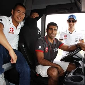 Formula One World Championship: Sakon Yamamoto Hispania Racing F1 Team in a transporter cab with Karun Chandhok Hispania Racing F1 Team