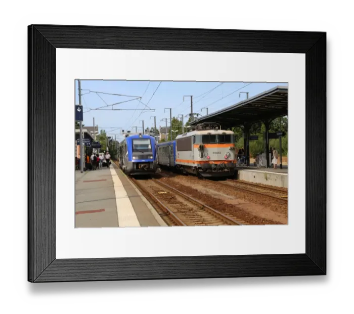 Framed Print : The 17. 30 from Dol de Bretagne to Dinan and a down Rennes train waiting at Dol de Framed Print : The 17. 30 from Dol de Bretagne to Dinan and a down Rennes train waiting at Dol de