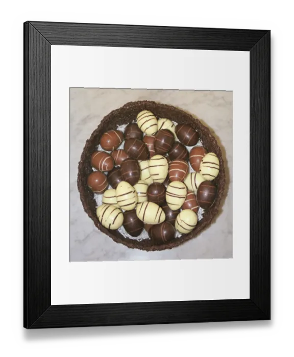 Framed Print : Mini Easter eggs in chocolate nest Framed Print : Mini Easter eggs in chocolate nest