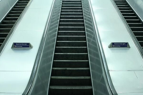 Escalators at Charing Cross underground station, London