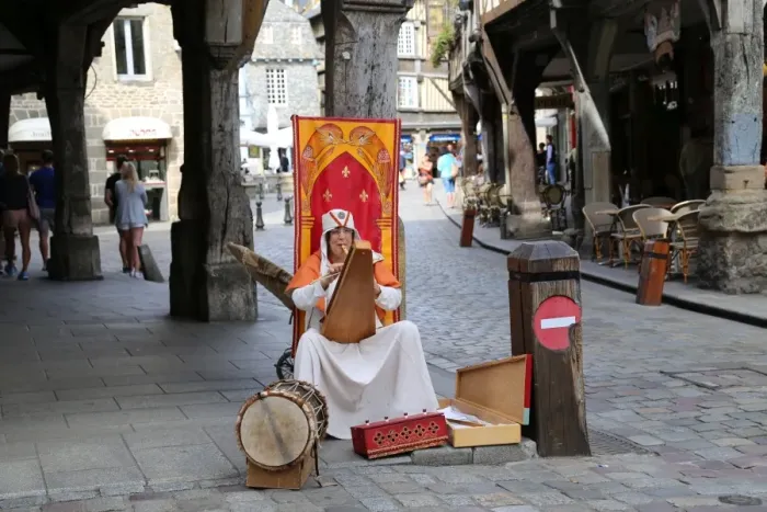 Framed Print : Medievial busker, Dinan, Brittany, France