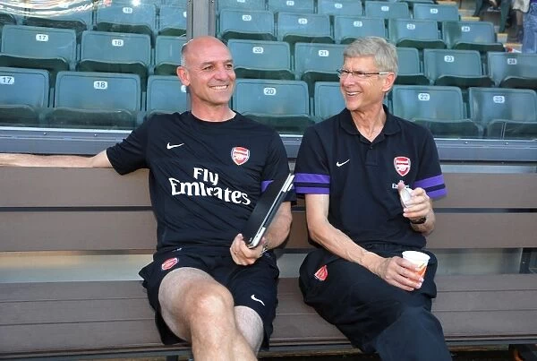 Arsene Wenger and Steve Bould Share a Laugh Before Kitchee FC vs. Arsenal FC Match (2012)