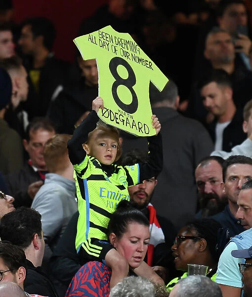 Young Arsenal Fan's Anticipation: RC Lens vs. Arsenal, UEFA Champions League 2023 / 24
