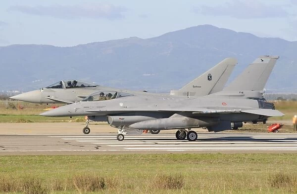 A Eurofighter 2000 Typhoon and a F-16ADF, both from the Italian Air Force