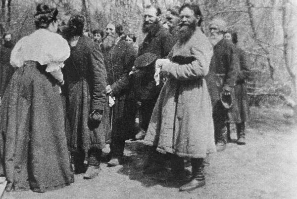 Landowner giving the Paschal greeting to her peasants, Russia, 1890s