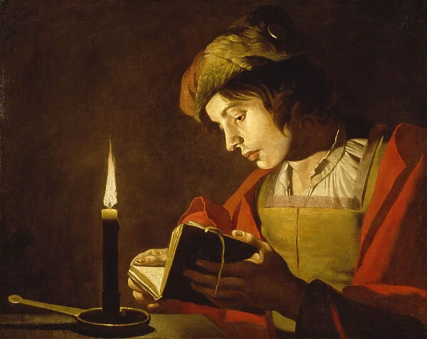 A Young Man Reading by Candlelight, c. 1630