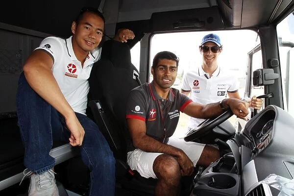 Formula One World Championship: Sakon Yamamoto Hispania Racing F1 Team in a transporter cab with Karun Chandhok Hispania Racing F1 Team