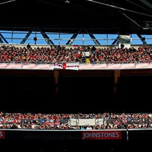 Triumphant Moment: Johnstones Paint Trophy Victory Celebrations by Ecstatic Bristol City Fans at Wembley Stadium