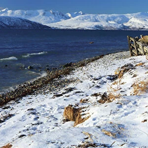 Rorbu and fjord near Sommaroy, Troms og Finnmark, north west Norway, Scandinavia, Europe