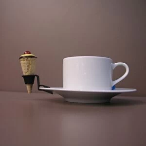 Coffee cup with ice cream cone