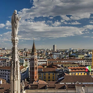 City skyline view from the roof of Duomo cathedral, Milan, Lombardy, Italy