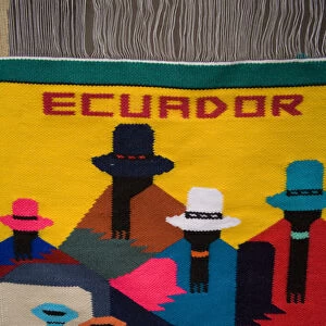 South America, Ecuador, Saquisili, weaving on display at weekly food and crafts market