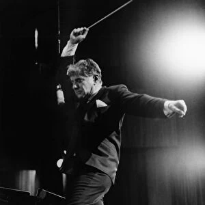 LEONARD BERNSTEIN (1918-1990). American composer and conductor. Conducting the orchestra at a rehearsal for the New York Philharmonics Peoples Concerts, November 1965