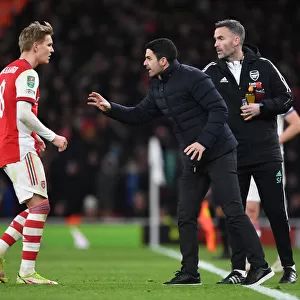 Arsenal Manager Mikel Arteta Strategizes with Martin Odegaard during Carabao Cup Semi-Final vs Liverpool