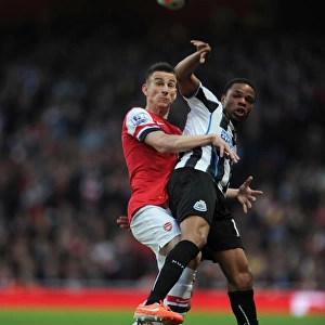 Arsenal vs Newcastle United: Koscielny vs Remy in Intense Battle