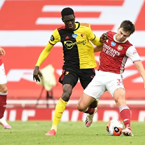 Arsenal's Kieran Tierney Clashes with Ismaila Sarr in Intense Premier League Face-off