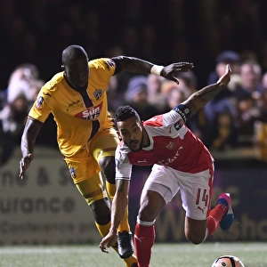 Theo Walcott vs. Kevin Amankwaah: A FA Cup Battle at Sutton United