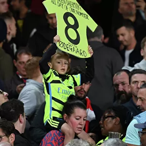 Young Arsenal Fan's Anticipation: RC Lens vs. Arsenal, UEFA Champions League 2023/24