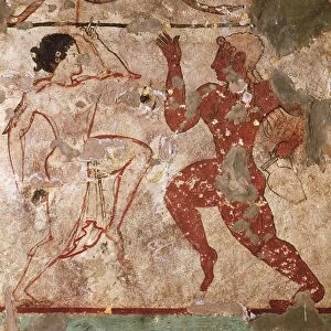 Italy, Latium Region, Tarquinia (Vt), Etruscan Necropolises, Tomb of Lioness, 6th century fresco with couple of dancers, she wears a transparent vest, hes naked with an olpe of wine, premise of an orgiastic dance