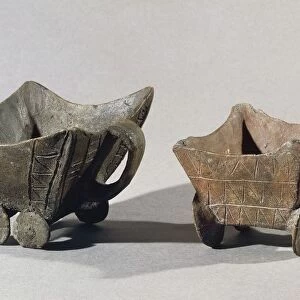 Wagon shaped clay pots from Budakalasz