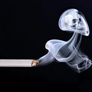 Cigarette with smoke and a skull, smoking kills, symbolic image of death from smoking, Germany