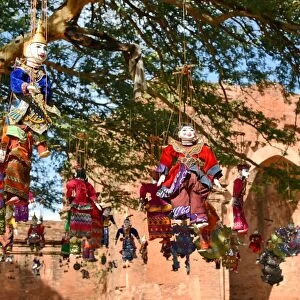Suspend dolls from tree at Dhamma Yan Gyi Temple, Bagan, unesco ruins Myanmar. Asia