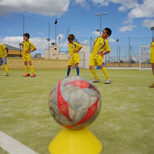 Young players of the Ronda Union Deportiva football club take part in a training