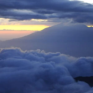 Dusk and clouds on Mount Kilimanjaro with Mount Meru in background (4566m), both volcanos