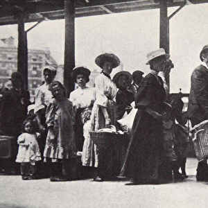 Immigrants arriving at Ellis Island, New York City, USA, c1905