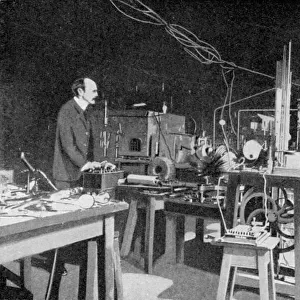 JJ Thomson, British physicist, at work in the Cavendish Laboratory, Cambridge