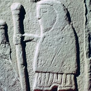 Detail of a Pictish Stone with a man wearing trousers, 11th century