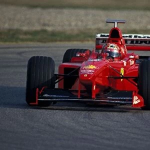 Max Biaggi Tests for Ferrari: Motorcycle racer Max Biaggi tests the 1998 Ferrari F300 F1 car