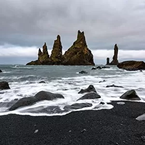 Basalt rock formations Troll toes on Black beach near Reynisdrangar, Vik, Iceland. Landscape photography
