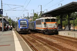 The 17. 30 from Dol de Bretagne to Dinan and a down Rennes train waiting at Dol de